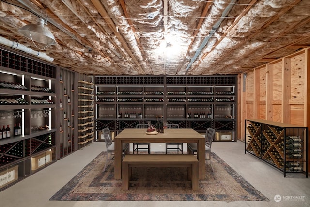 wine cellar featuring concrete flooring