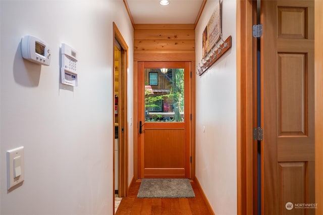 doorway to outside with light wood-type flooring