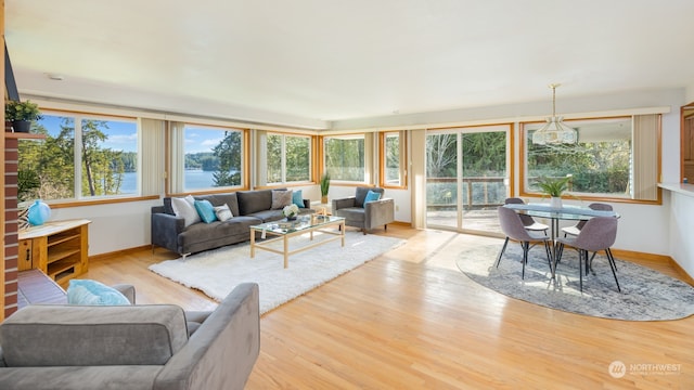 sunroom / solarium featuring a healthy amount of sunlight