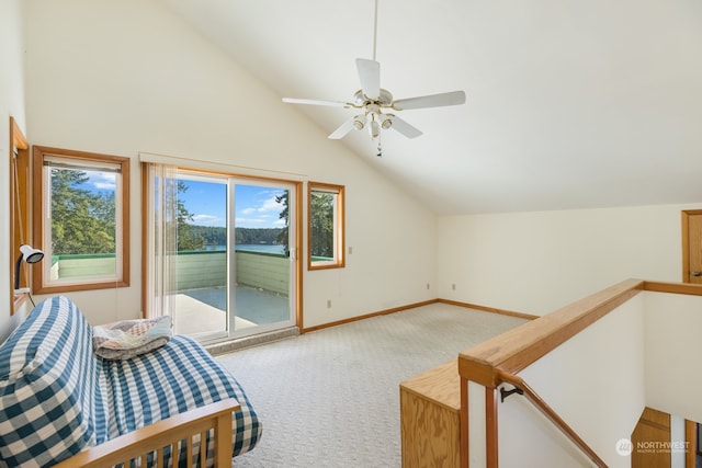 carpeted bedroom with access to outside, vaulted ceiling, baseboards, and ceiling fan