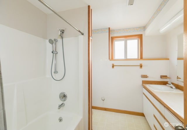 full bath with visible vents, tub / shower combination, vanity, baseboards, and tile patterned floors