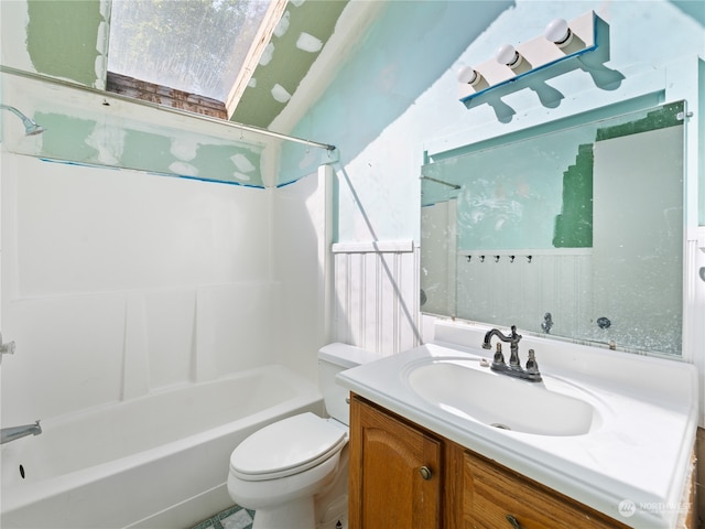 full bathroom featuring bathtub / shower combination, vanity, and toilet