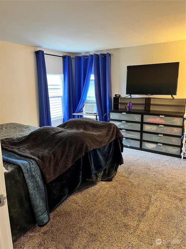 bedroom featuring carpet and cooling unit