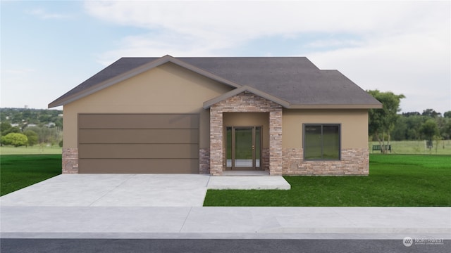 view of front of house featuring a garage and a front yard