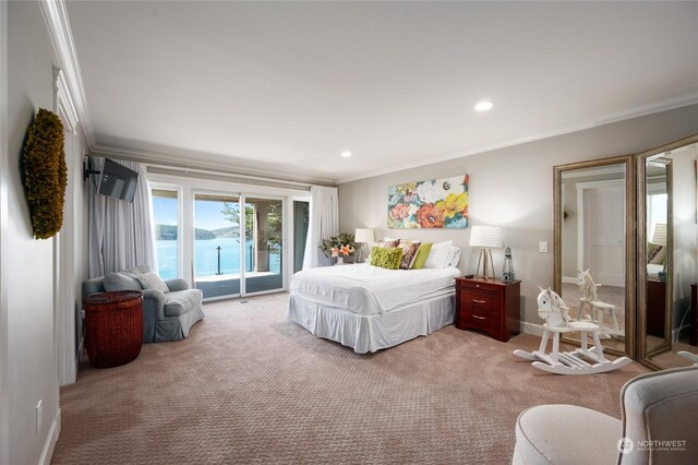 bedroom featuring access to outside, ornamental molding, and carpet