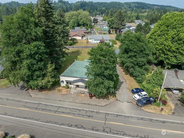 aerial view with a wooded view