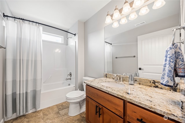 full bathroom featuring toilet, vanity, and shower / tub combo with curtain