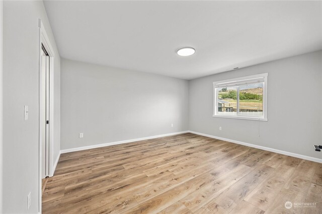 empty room featuring light wood-type flooring