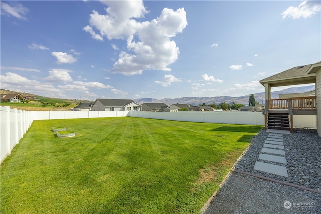 view of yard with a mountain view