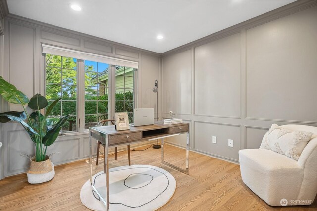 office with light hardwood / wood-style flooring