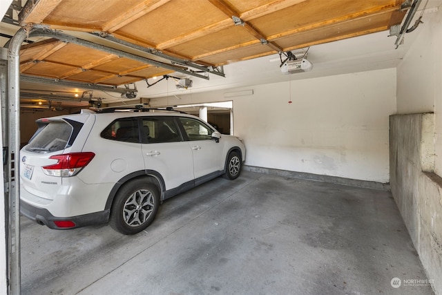 garage featuring a garage door opener