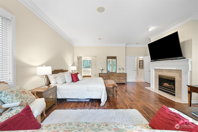 bedroom featuring dark hardwood / wood-style flooring and crown molding