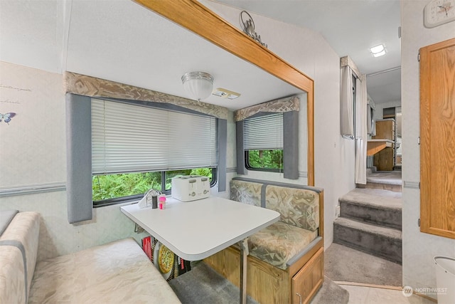 1056 Birch Ln, Sumas, WA 98266 - carpeted dining space with plenty of natural light and stairway