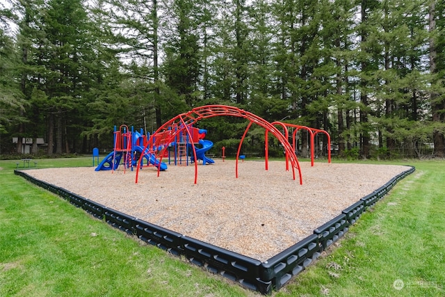 view of jungle gym featuring a yard