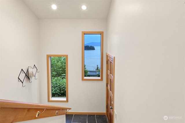 interior space featuring dark tile patterned floors