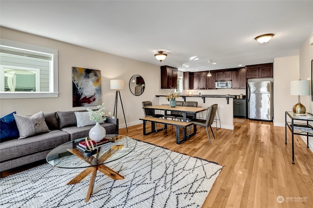 living room featuring light wood-type flooring