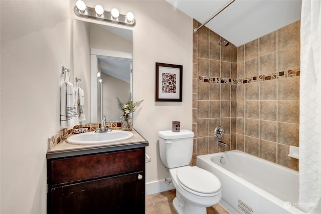 full bathroom featuring toilet, tile patterned floors, vanity, vaulted ceiling, and shower / bath combination with curtain