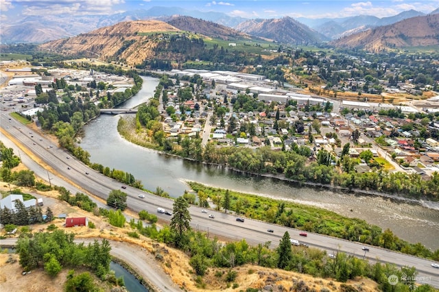 aerial view with a water and mountain view