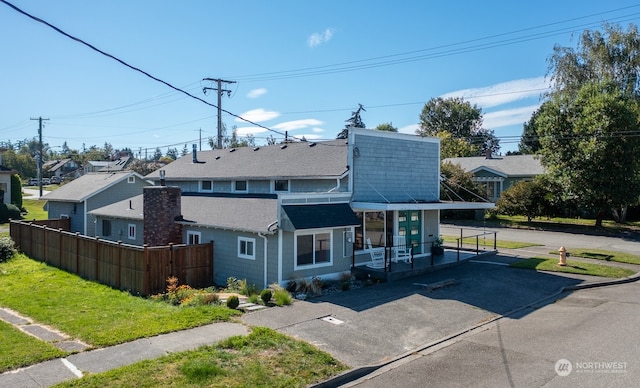 exterior space featuring a front lawn