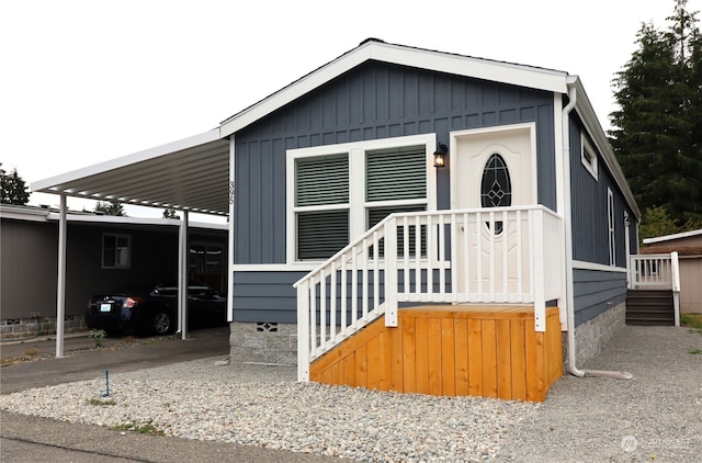 manufactured / mobile home featuring a carport