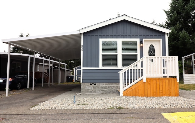 manufactured / mobile home with a carport