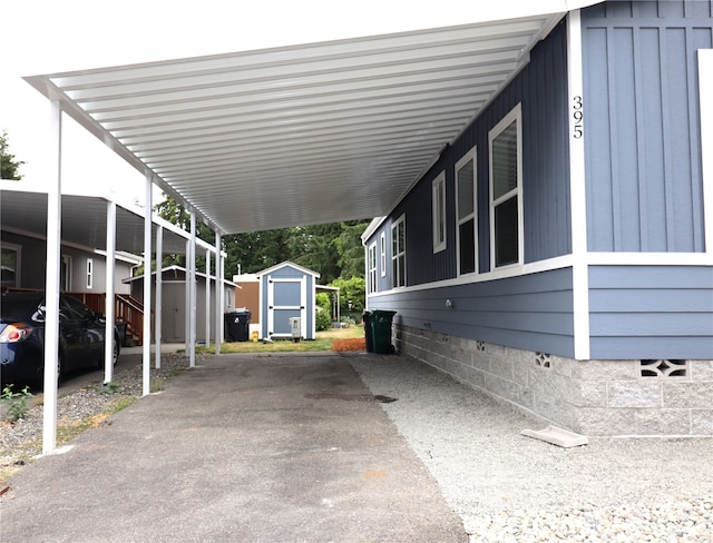 view of parking / parking lot featuring a carport