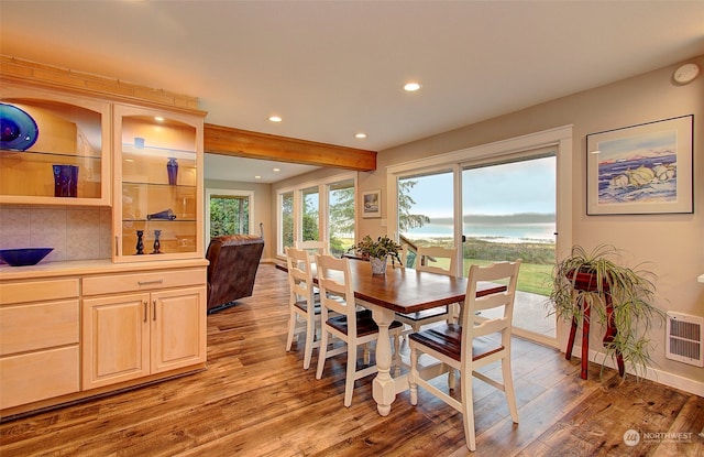 24424 Sandridge Rd, Ocean Park, WA 98640 - dining room featuring recessed lighting, light wood-style floors, beamed ceiling, heating unit, and baseboards