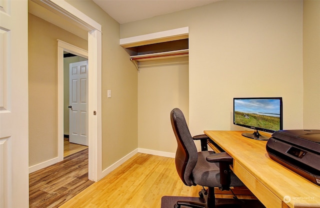 24424 Sandridge Rd, Ocean Park, WA 98640 - home office featuring light wood-type flooring and baseboards
