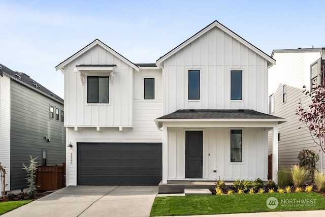 modern inspired farmhouse featuring a garage