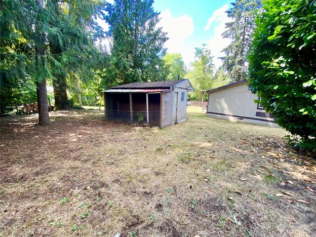 exterior space featuring an outdoor structure