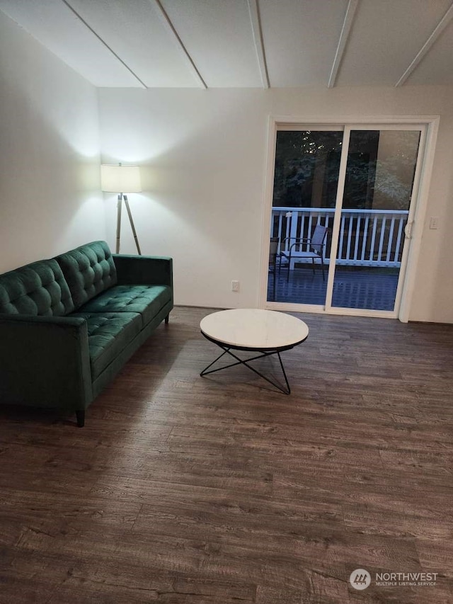 living room with dark hardwood / wood-style floors