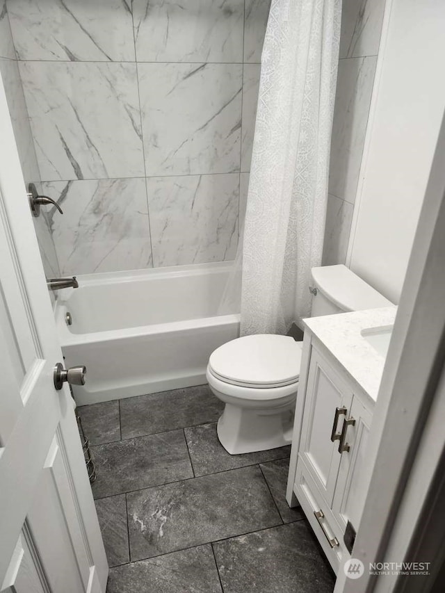 full bathroom with vanity, toilet, and shower / bath combo with shower curtain