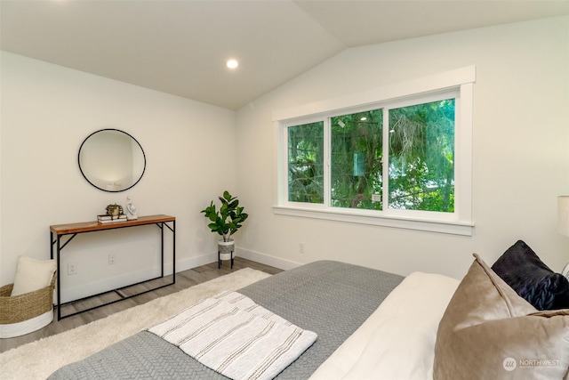 bedroom featuring vaulted ceiling, recessed lighting, baseboards, and light wood-style floors