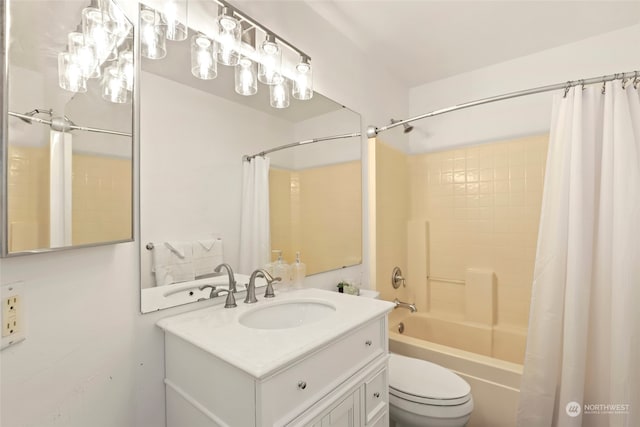 full bathroom with vanity, toilet, and shower / bath combo