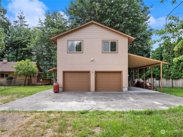 garage with a lawn