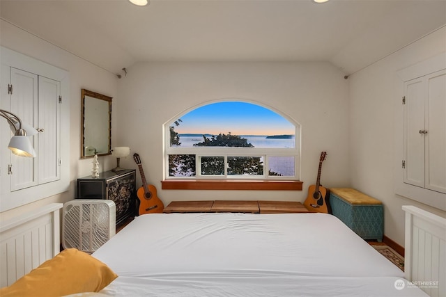 bedroom with vaulted ceiling