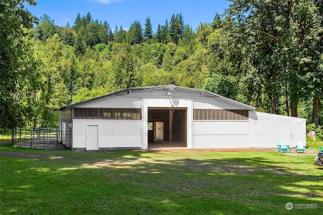 garage featuring a yard