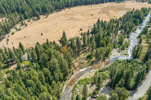birds eye view of property featuring a rural view