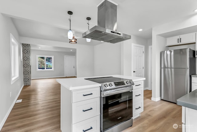 kitchen with light hardwood / wood-style flooring, island range hood, stainless steel appliances, pendant lighting, and white cabinets