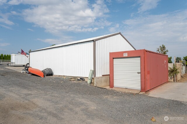 view of outbuilding with a garage