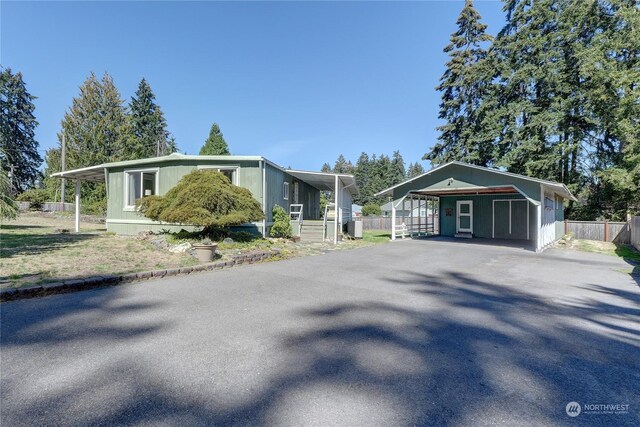 view of front of home featuring a carport