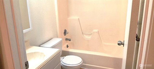 12602 NE 118th St, Kirkland, WA 98034 - full bathroom with a textured wall, toilet, vanity, and shower / bathtub combination
