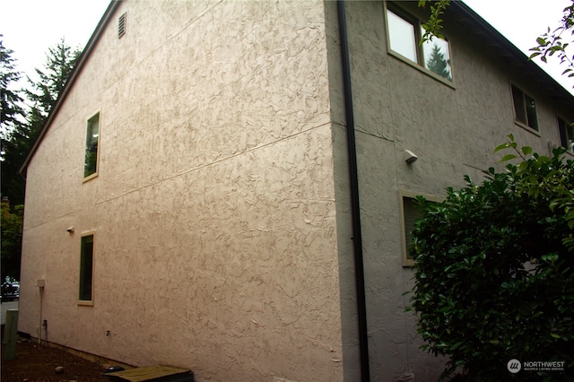 12602 NE 118th St, Kirkland, WA 98034 - view of side of property with stucco siding