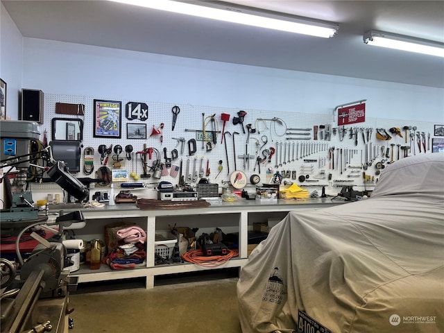 workout area with a workshop area