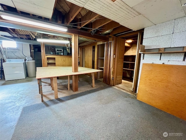 basement featuring washing machine and dryer