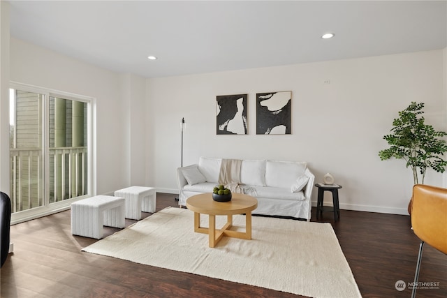 living room featuring dark hardwood / wood-style floors