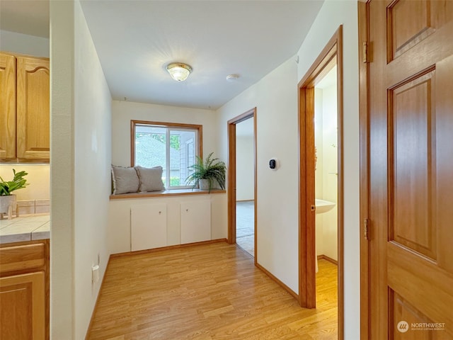 hall featuring light hardwood / wood-style flooring