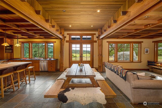 interior space featuring wood ceiling and french doors