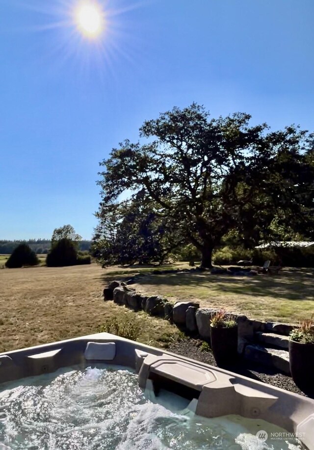 view of community featuring a hot tub