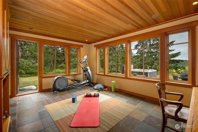 workout room featuring wood ceiling